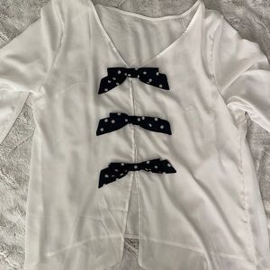 White blouse with polka dot bows